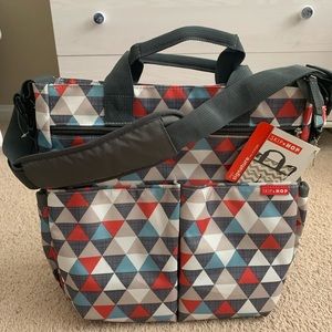 Brand new gender neutral Skiphop diaper bag.